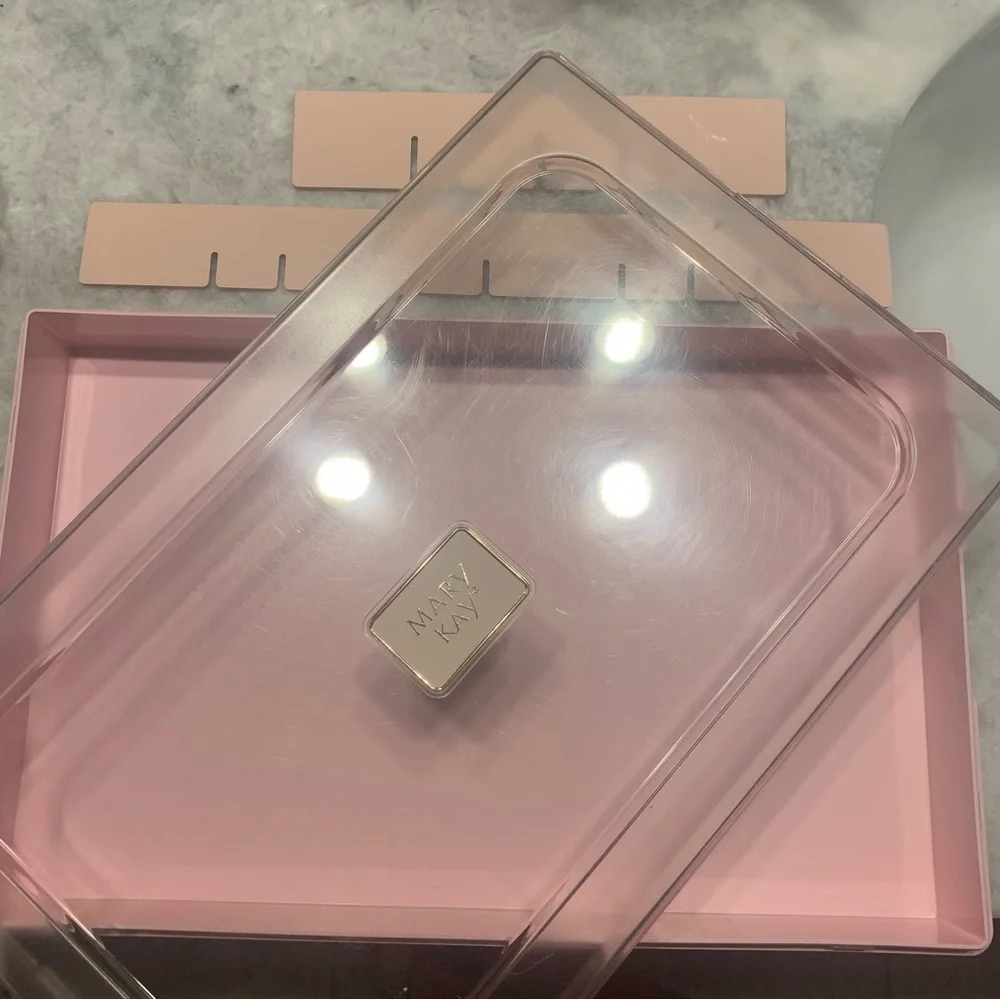 Vintage Mary Kay Cosmetic Shade Organizer in pink.